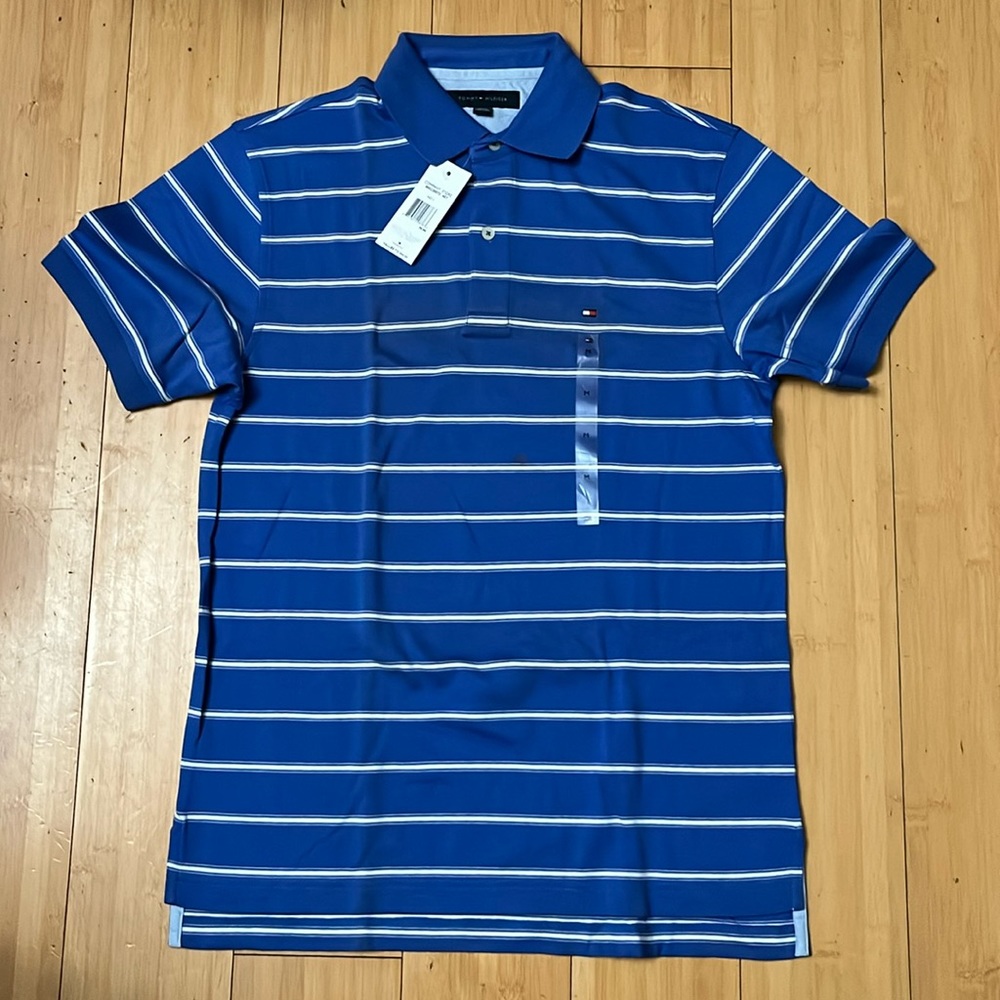 Tommy Hilfiger Polo T-shirt in blue with white stripes. Medium
